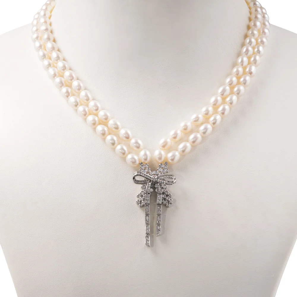 Elegant Double-Strand Pearl Necklace with Crystal Bow Pendant – Timeless Bridal & Evening Jewellery for Women